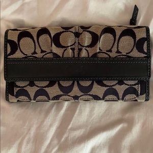 Large lightly used navy COACH trifold wallet